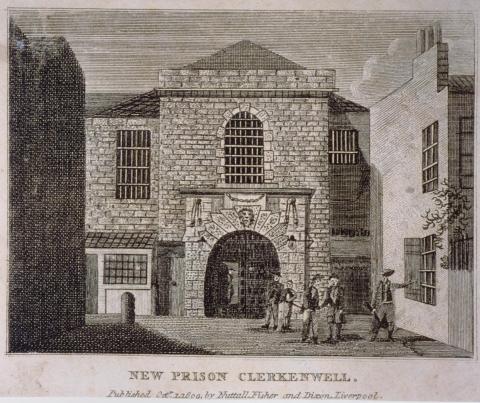 A view of the stone built frontage and main gate of New Prison, with several chained figures standing in front, and a further figure holding a gun.  A small door, in a large arched doorway is open, and a small figure can be seen peering out.